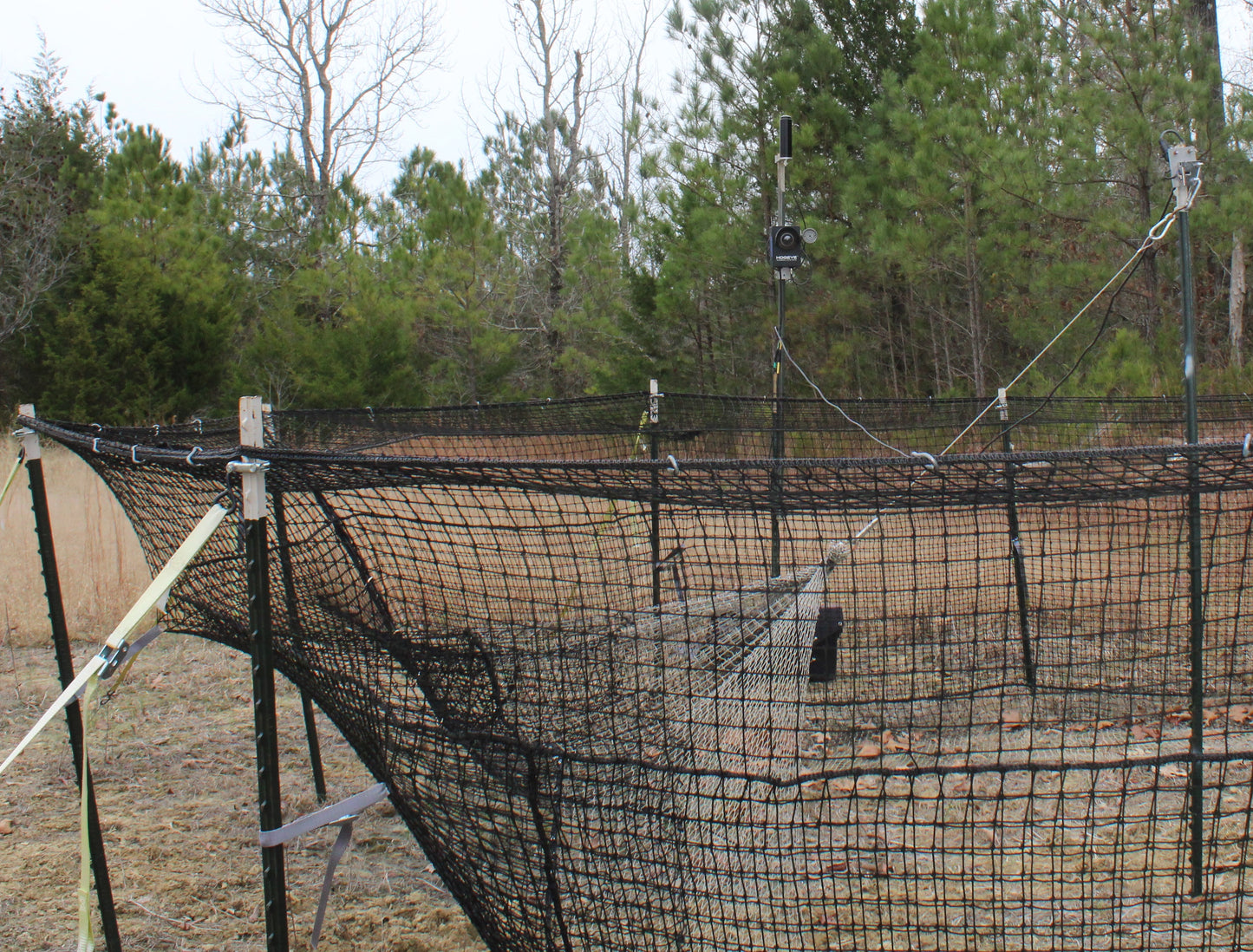 HogEye Camera System connected to the Pig Brig Net Trap saving you time from running back and forth to the trap.