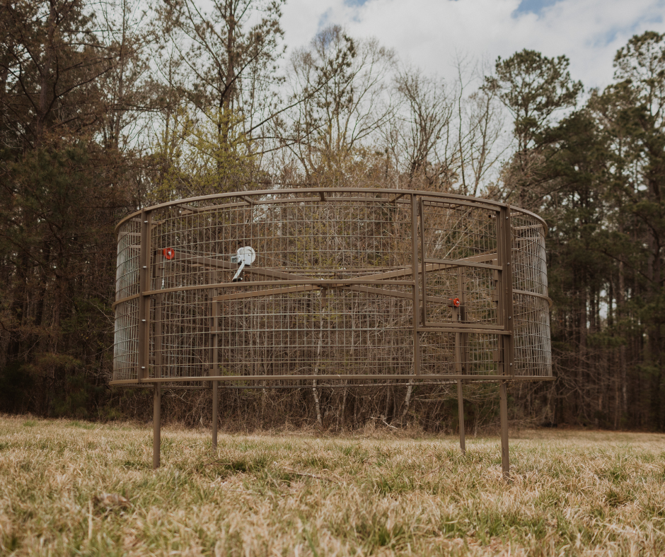 Suspended Big Pig Trap in a field.