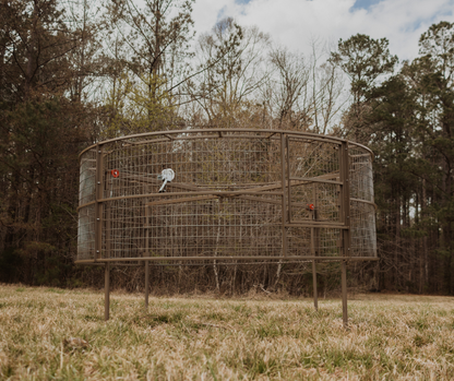 Suspended Big Pig Trap in a field. 