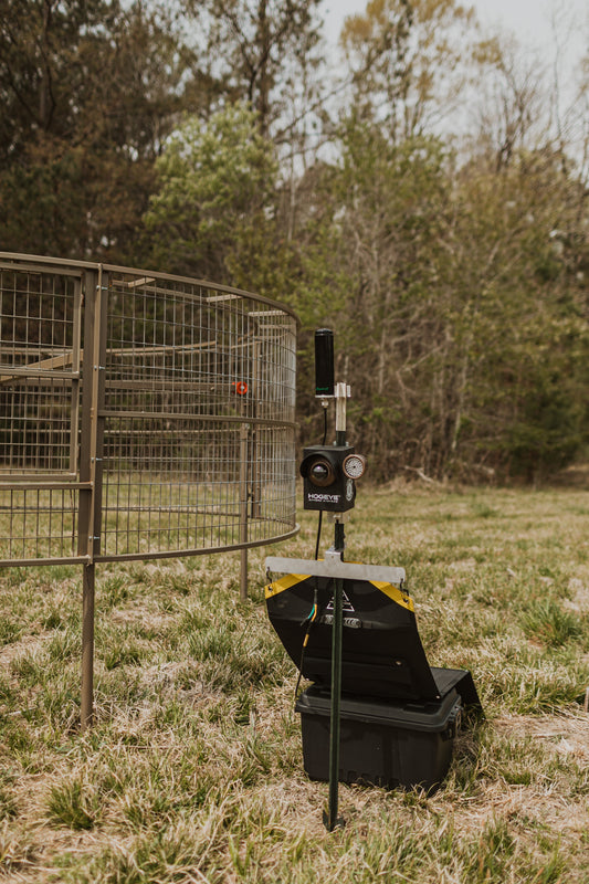 Big Pig Drop Trap is a fully suspended hog trap. 48"High-12'Diameter. Paired with the HogEye Camera System, you can monitor your trap and drop then suspended hog trap using the mobile app, giving you control of when you trap hogs. 